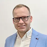 Zdjęcie portretowe Tomasza Soleckiego.